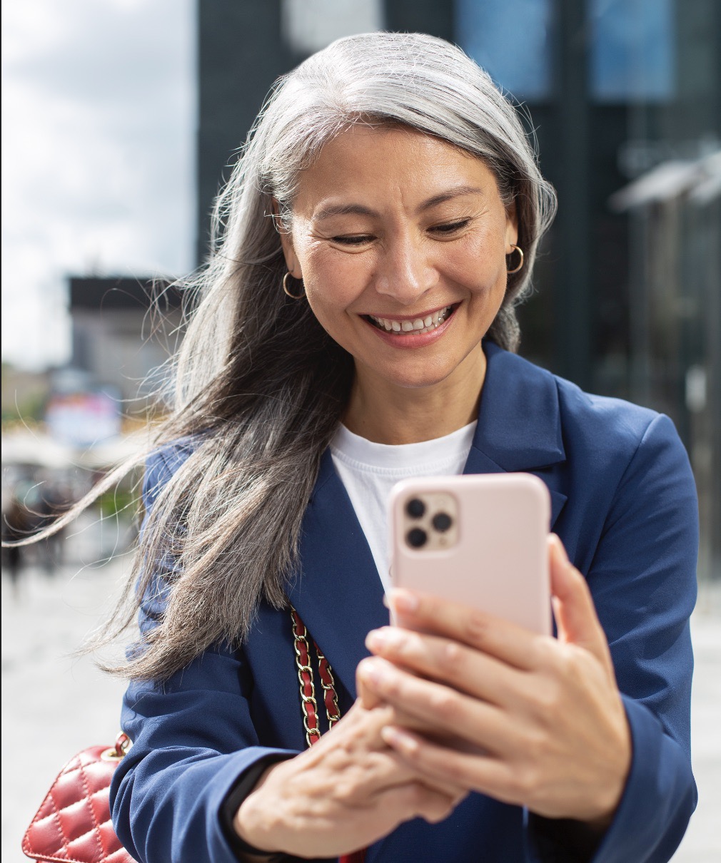 happy senior on phone