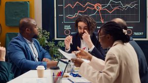 Coworkers analyzing company data
